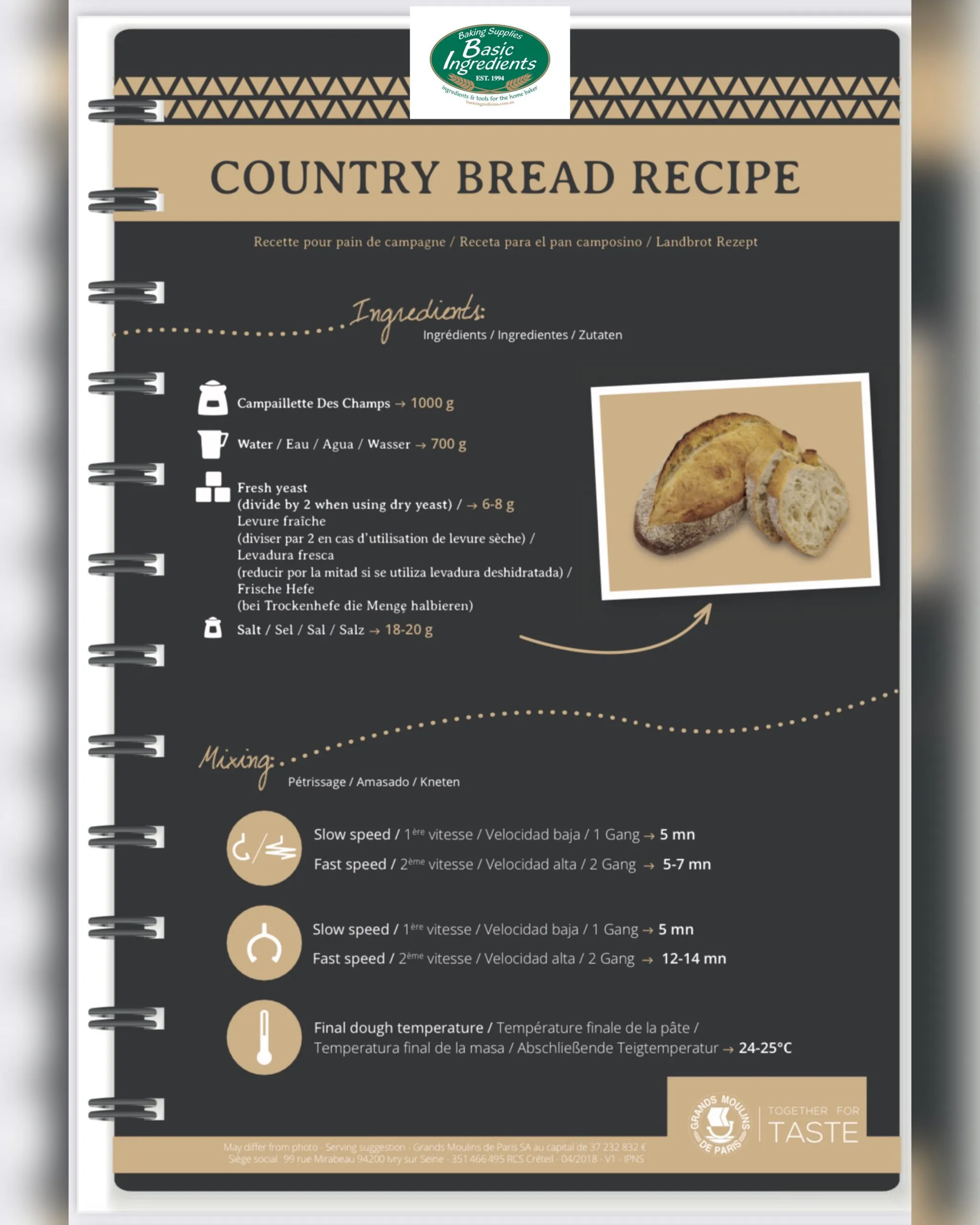 Artisan bread loaf displayed on wooden surface for baking inspiration