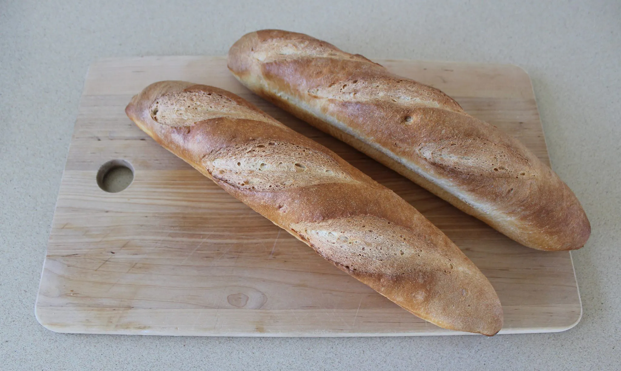 French stick bread loaf with crisp crust and elongated shape
